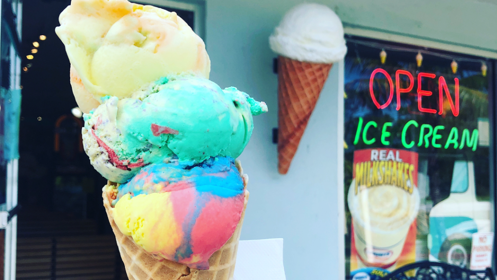 A rainbow-colored ice cream creation from Shark Shack Sweets