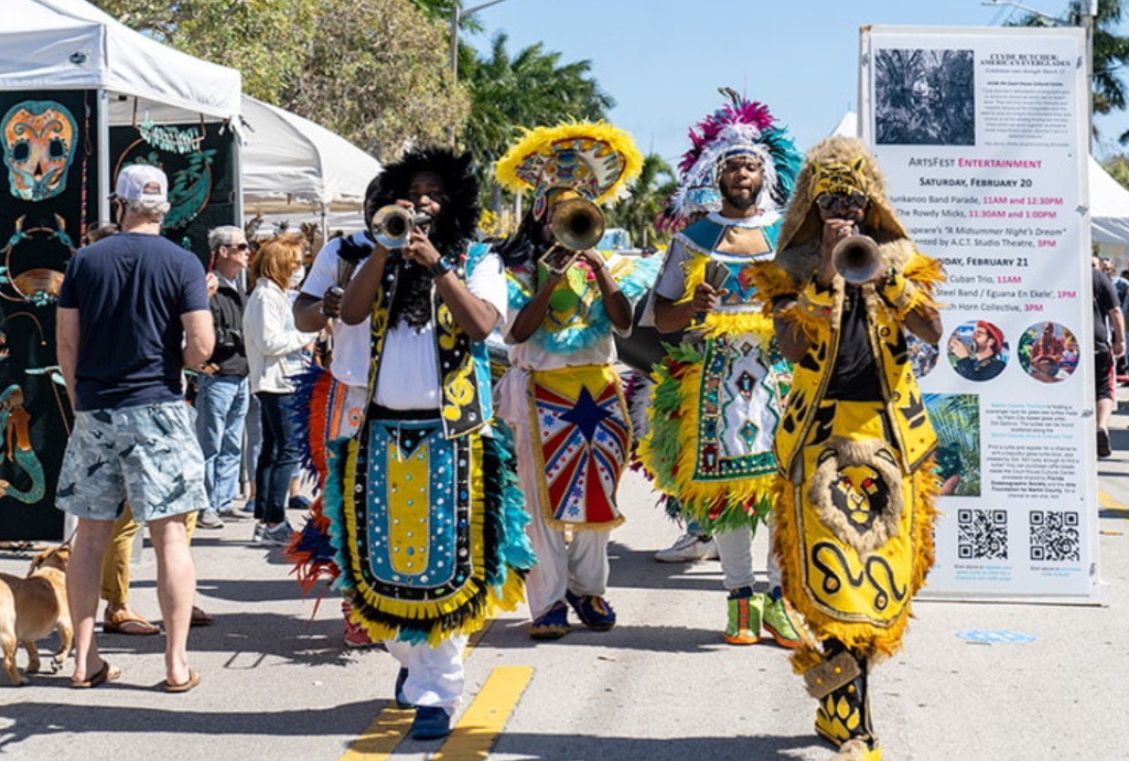 ArtsFest band plays whilem arching through the streets